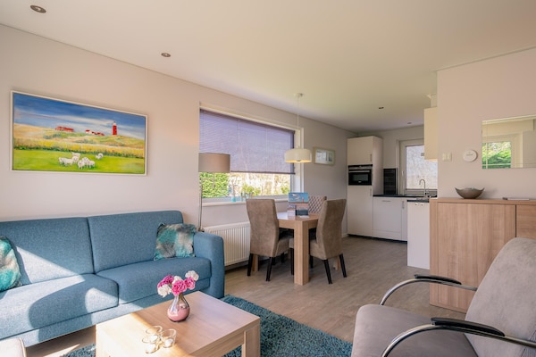 Foto van Sfeervolle vrijstaande bungalow voor 4 personen - Vakantiehuis in De Koog - LivingRoom