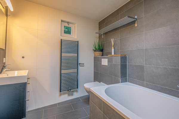 Foto van Sfeervolle 2-persoons vakantiewoning - Vakantiehuis in De Koog - BathRoom