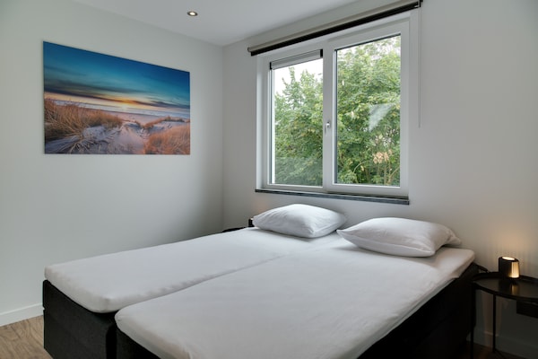 Foto van Bungalow op Texel bij duinenpark - Vakantiehuis in De Koog Texel - BedRoom