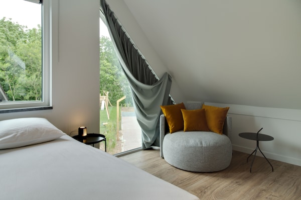 Foto van Bungalow op Texel bij duinenpark - Vakantiehuis in De Koog Texel - BedRoom