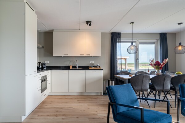 Foto van Huis bij Scherpenisse Strand met Tuin - Vakantiehuis in Scherpenisse - Kitchen
