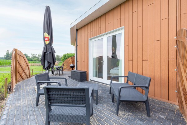 Foto van Vakantiehuis in bosrijke omgeving met terras - Vakantiehuis in Goirle - TerraceBalcony