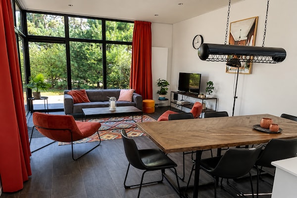 Foto van Relaxed Woodland Chalet voor 6 personen - Vakantiehuis in Otterlo - LivingRoom