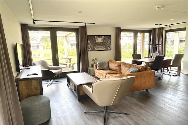Foto van Vrijstaande bosvilla voor 6 personen, wandel-/fietsroute in Lochem. - LivingRoom