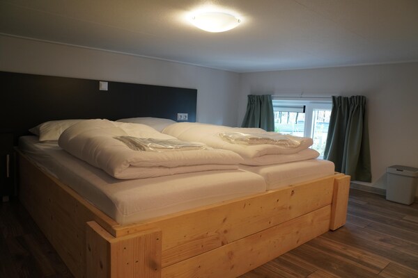 Foto van Tiny House met uitzicht op het bos - Vakantiehuis in Hoenderloo - BedRoom
