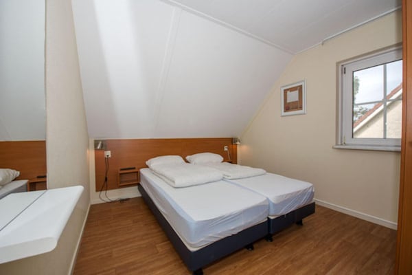 Foto van Stijlvol verblijf met uitzicht op de tuin - Vakantiehuis in Hellendoorn - BedRoom