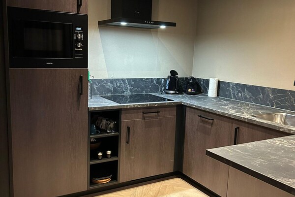 Foto van Privésauna bij Wellness Lodge in Drenthe - Vakantiehuis in Dalerveen - Kitchen