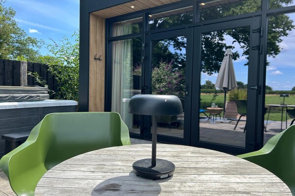 Foto van Privésauna bij Wellness Lodge in Drenthe - Vakantiehuis in Dalerveen - TerraceBalcony