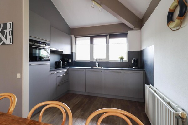 Foto van Premium wellnessvilla aan het water - Vakantiehuis in Makkum - Kitchen