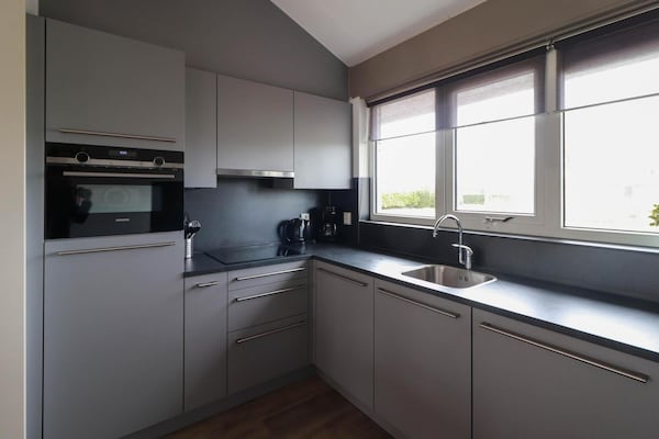 Foto van Premium wellnessvilla aan het water - Vakantiehuis in Makkum - Kitchen