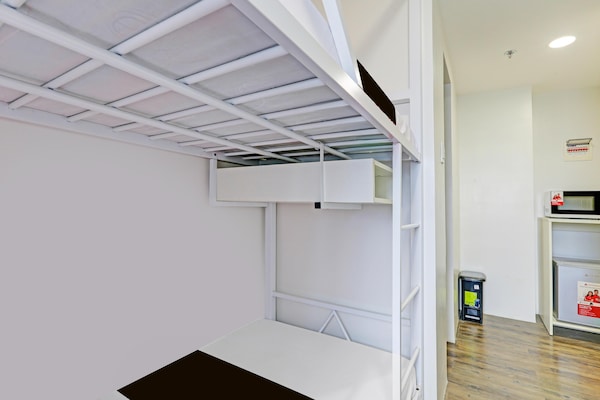 Foto van Trendy gemengd slaapverblijf voor Makati Nights - Vakantiehuis in Makati City - BedRoom