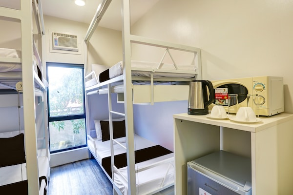 Foto van Trendy gemengd slaapverblijf voor Makati Nights - Vakantiehuis in Makati City - BedRoom