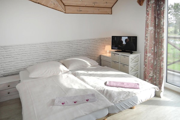 Foto van Villa in Troszyn bij meer met strand - Vakantiehuis in Troszyn - BedRoom