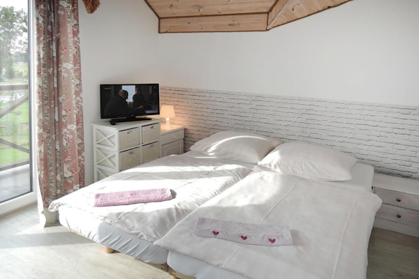 Foto van Villa in Troszyn bij meer met strand - Vakantiehuis in Troszyn - BedRoom