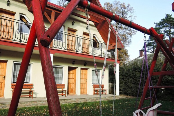 Foto van Vakantiehuis Pobierowo bij Oostzeestrand - Vakantiehuis in Pobierowo - ExteriorSummer