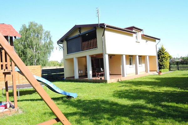 Foto van Vakantiehuis bij Oostzee & Zandstranden - Vakantiehuis in Miedzyzdroje - ExteriorSummer