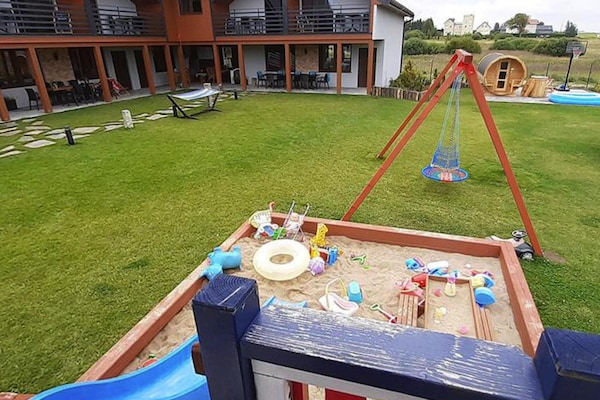 Foto van Vakantiehuis met 4 slaapkamers, sauna en jacuzzi - Vakantiehuis in Mielenko - GardenSummer