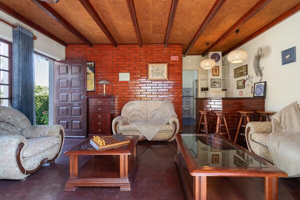 Foto van Privéverblijf in Sintra met bar en tuin - Vakantiehuis in Colares - LivingRoom