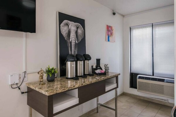 Foto van Premium kamer met 2 tweepersoonsbedden | Gratis wifi en tv - Facilities