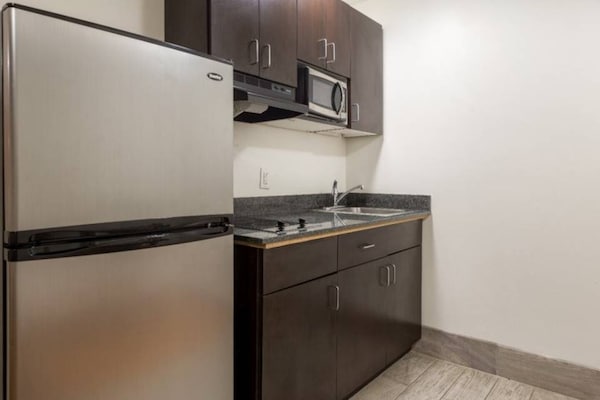 Foto van 1 kingsize bed | Premium, koelkast - Vakantiehuis in Greenville - Facilities