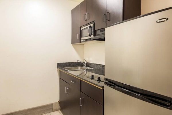 Foto van 1 kingsize bed | Premium, koelkast - Vakantiehuis in Greenville - Facilities