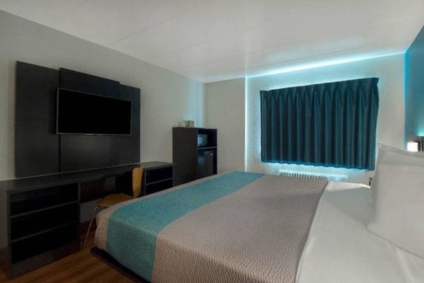 Foto van 1 kingsize bed | Micfridge - Vakantiehuis in MERRILLVILLE - BedRoom