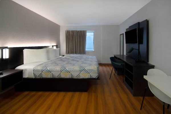 Foto van 1 tweepersoonsbed | Douche conform ADA/RI-normen - Vakantiehuis in MERRILLVILLE - BedRoom