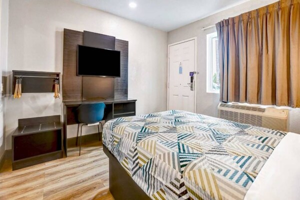 Foto van 1 tweepersoonsbed | Rolstoeltoegankelijke/RI-douche / Luxe - Facilities