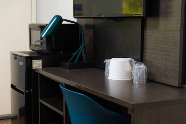 Foto van 1 tweepersoonsbed (Queensize) | Motel 6 Lantana - Vakantiehuis in Lantana - Facilities
