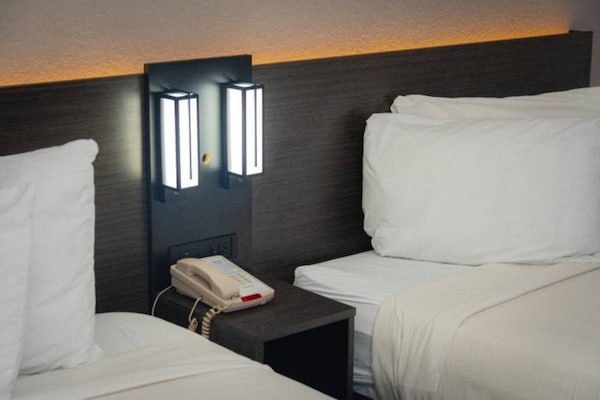 Foto van 1 tweepersoonsbed (queensize) | Rookvrij - Vakantiehuis in Coral Springs - Facilities