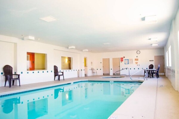 Foto van 1 kingsize bed | Rookvrij - Vakantiehuis in Las Cruces - Pool