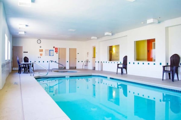 Foto van 1 kingsize bed | Rookvrij - Vakantiehuis in Las Cruces - Pool