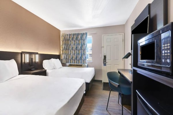 Foto van 1 tweepersoonsbed | Premium minikoelkast - Vakantiehuis in Kirkland - BedRoom
