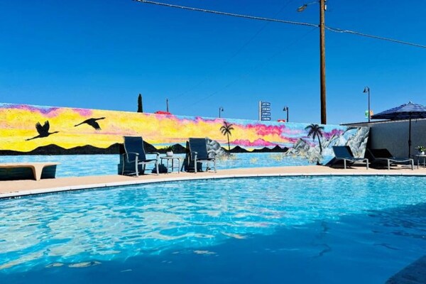 Foto van 1 tweepersoonsbed (queensize) | Slaapbank - Vakantiehuis in Sierra Vista - Pool