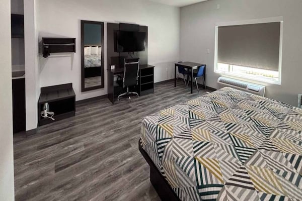 Foto van 1 kingsize bed | Rookvrij, Keuken - Vakantiehuis in Dallas - BedRoom