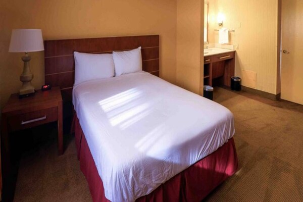 Foto van 1 kingsize bed | Zakelijk, NSMK, Keuken - Vakantiehuis in Phoenix - BedRoom