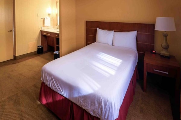 Foto van 1 kingsize bed | Zakelijk, NSMK, Keuken - Vakantiehuis in Phoenix - BedRoom