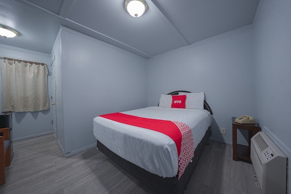 Foto van Tweepersoonsbed (Queensize) | OYO Hotel Portland - Vakantiehuis in Sandy OR - BedRoom