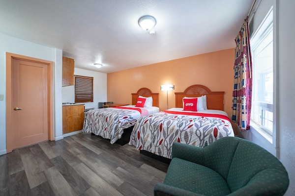 Foto van Premium kamer met 2 queensize bedden en kitchenette. - BedRoom