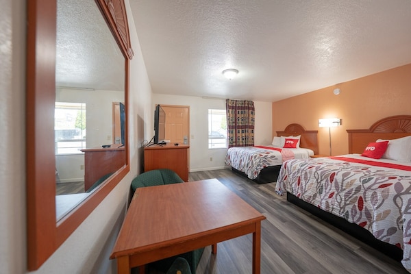 Foto van Premium kamer met 2 queensize bedden en kitchenette. - BedRoom
