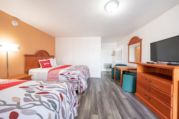 Foto van Premium kamer met 2 queensize bedden en kitchenette. - BedRoom