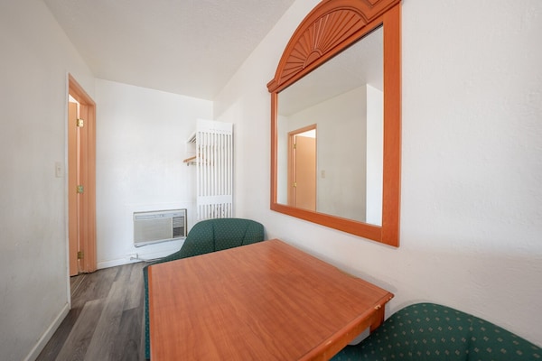 Foto van Premium kamer met 2 queensize bedden en kitchenette. - BedRoom