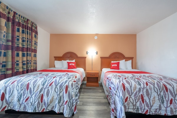 Foto van Premium kamer met 2 queensize bedden en kitchenette. - BedRoom