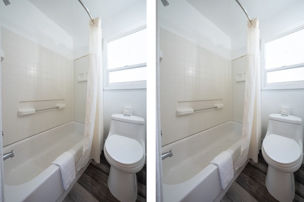 Foto van Premium kamer met 2 queensize bedden en kitchenette. - BathRoom