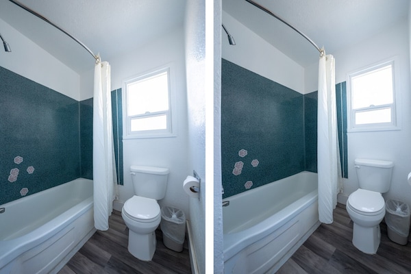 Foto van Premium kamer met 2 queensize bedden en kitchenette. - BathRoom