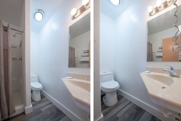 Foto van Premium kamer met 2 queensize bedden en kitchenette. - BathRoom