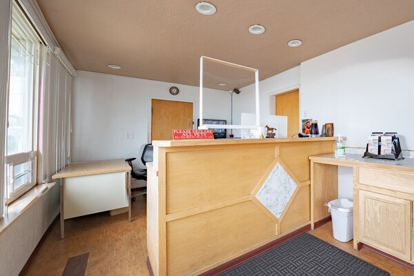 Foto van Premium kamer met 2 queensize bedden en kitchenette. - HallReception