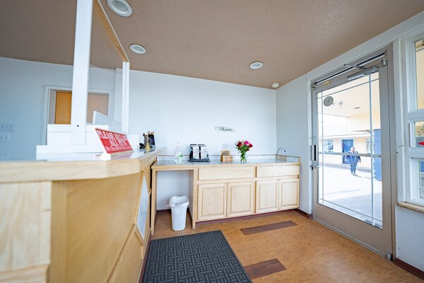Foto van Premium kamer met 2 queensize bedden en kitchenette. - HallReception