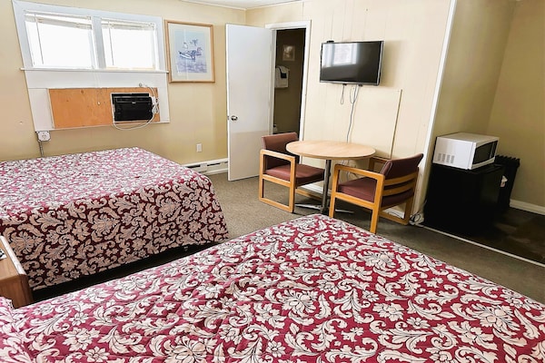 Foto van 2 tweepersoonsbedden_ Love Hotels Timberline - Vakantiehuis in Ironwood - BedRoom