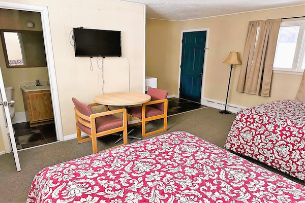 Foto van 2 tweepersoonsbedden_ Love Hotels Timberline - Vakantiehuis in Ironwood - BedRoom